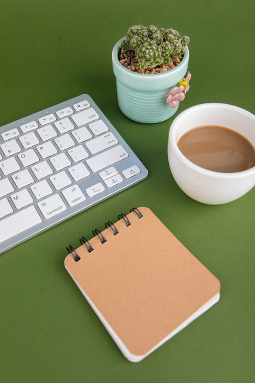 鍵盤記事本辦公用品商務攝影圖的藝術與應用